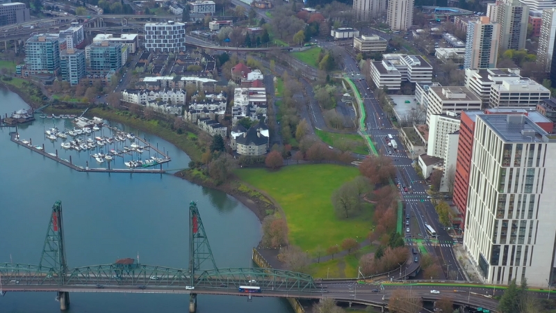 Aerial view of Portland with its bridges, waterfront, and urban landscape