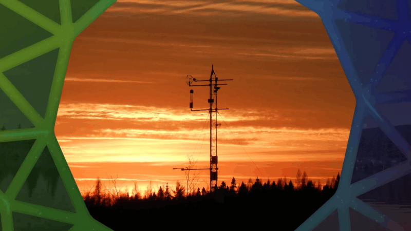 Carbon flux tower measuring CO₂ exchange at sunset
