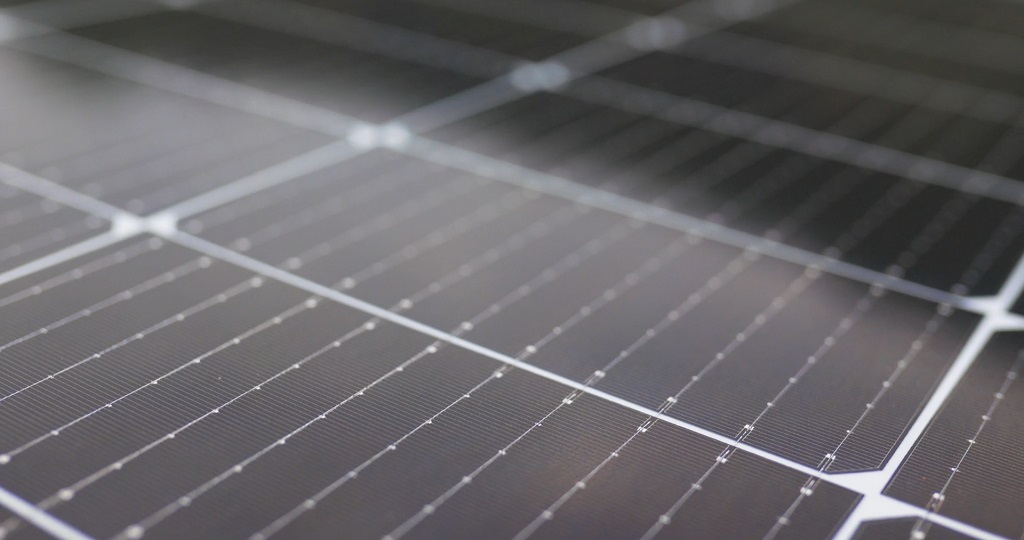 Close-up of modern solar panels, highlighting renewable energy solutions for home efficiency