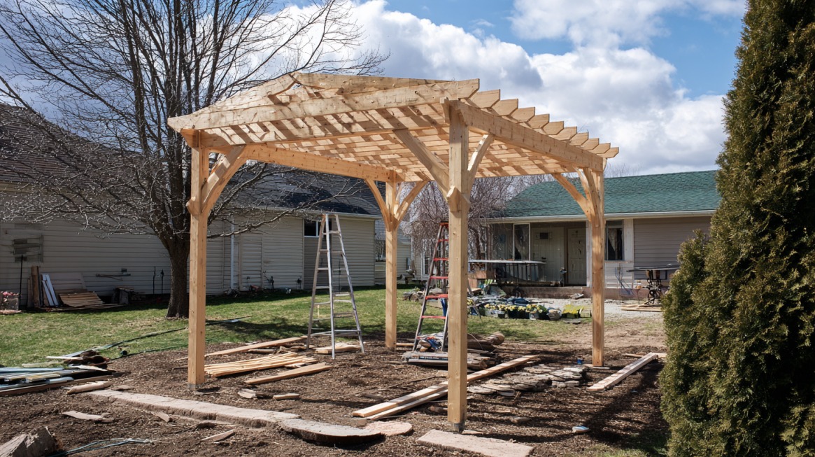 Partially completed wooden pergola structure in a backyard with ladders and construction materials