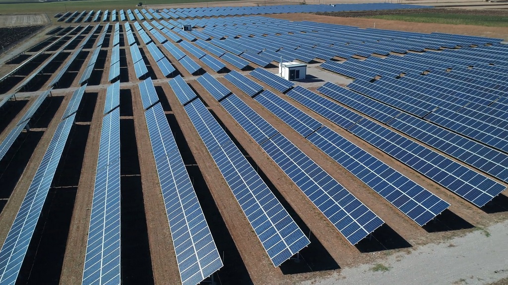 Spacious solar array farm strategically placed on rural land