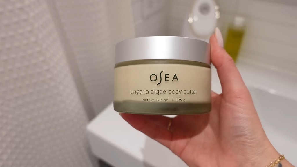 OSEA Undaria Algae Body Butter in a glass jar with silver lid, natural body cream