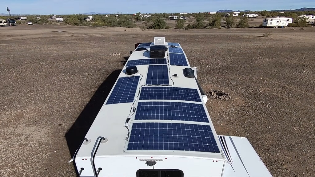 Van roof equipped with solar panels illustrating typical energy setups for off-grid van living