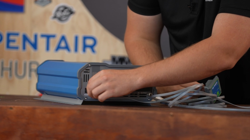 Technician connecting a pure sine wave inverter for reliable power use