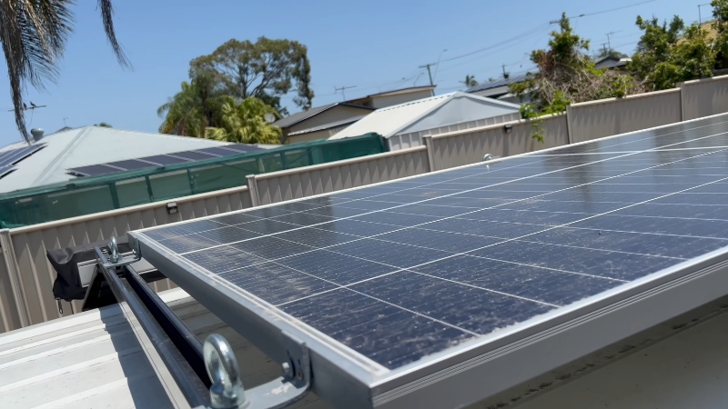 500W solar panels installed on a residential rooftop under clear daylight