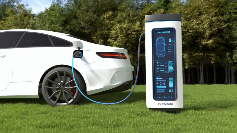 EV charging station powering a white electric car outdoors