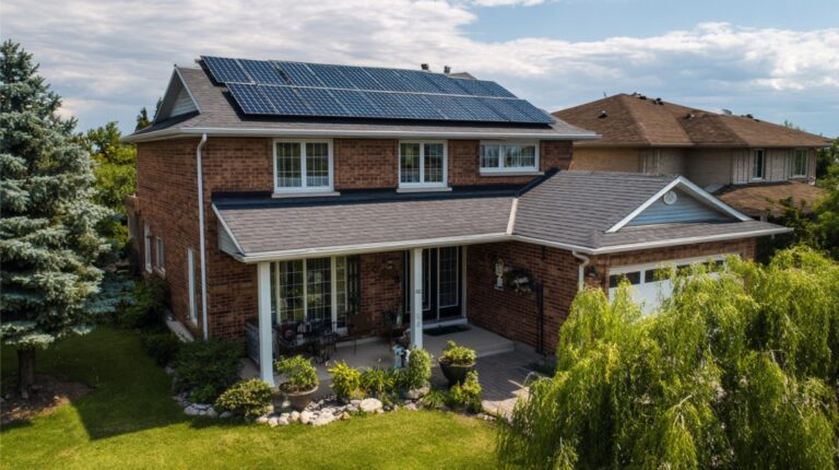 Residential home with solar panels installed on the roof